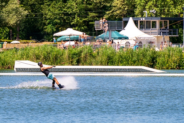 Waterskier in action at De IJzeren Man waterskiing track in Weert